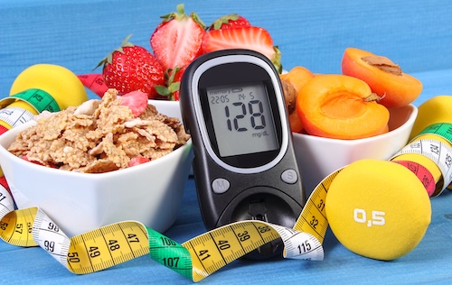 glucometer for checking sugar level, healthy food, dumbbells and centimeter, diabetes, healthy and sporty lifestyle